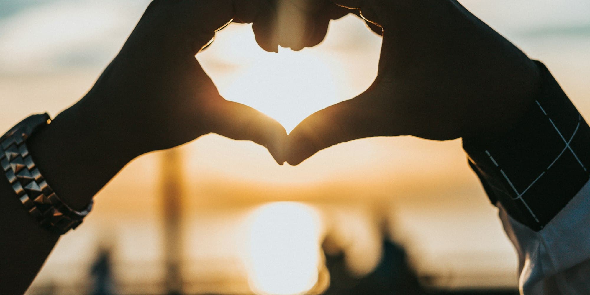 Couple listening together — audio guestbook voice messages carry emotional weight that written notes cannot